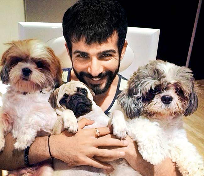 Jay Bhanushali with his pet dogs