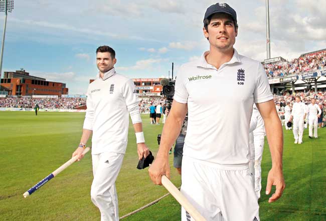 Masters in manchester: England captain Alastair Cook (right) and teammate James Anderson celebrate after beating India by an innings and 54 runs to win the fourth Test at Old Trafford in Manchester on Saturday. Pic/AFP