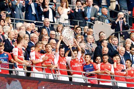 Arsenal thump Man City to win Community Shield in style