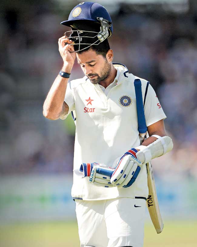 India opener Murali Vijay walks away dejected after being dismissed by pacer Chris Woakes for 18 on Saturday. Pic/Getty Images 