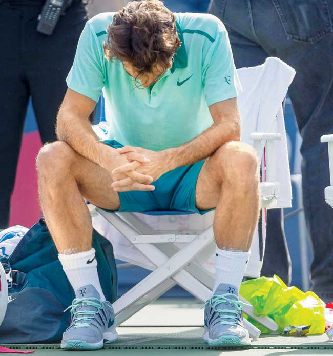 A dejected Federer after his loss. Pics/Getty Images
