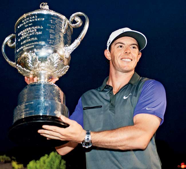 Rory McIlroy lifts the US PGA C’ship cup on Sunday. Pic/Getty Images 