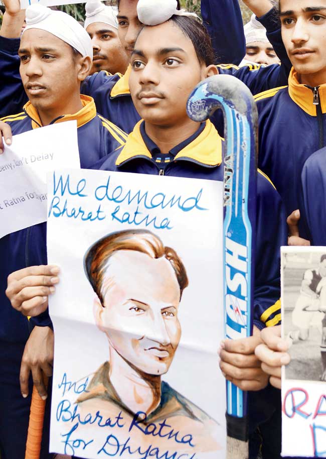 January 21, 2014: Indian hockey fans hold placards in Amritsar in protest of Dhyan Chand not being awarded the Bharat Ratna earlier this year. Pic/Getty Images