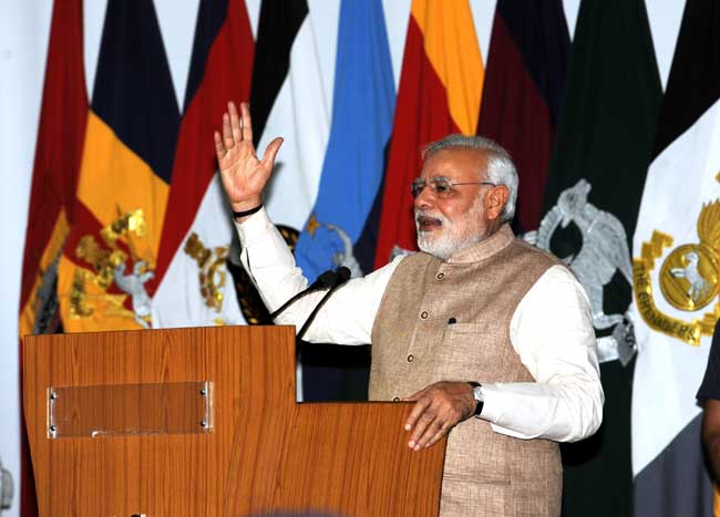 Prime Minister Narendra Modi addresses the officers, soldiers and air warriors of the Indian Armed Forces at Leh on August 12, 2014