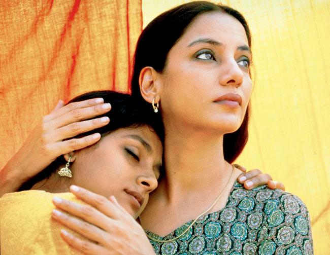 Nandita Das and Shabana Azmi in a still from the film, Fire (1996). As one of the first mainstream films in India to explicitly depict homosexual relations, it faced the wrath of Hindu fundamenstalists and a few political parties, post which it was withdrawn from the theatres only to be released later. 