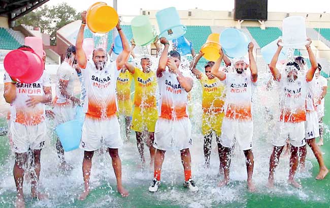 Members of the Indian hockey team take up the ALS Ice Bucket Challenge at New Delhi