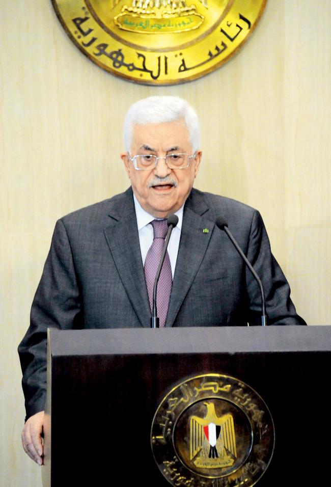 Mahmud Abbas speaks at a press conference after meeting with Egyptian President Abdel Fattah al-Sisi in Cairo