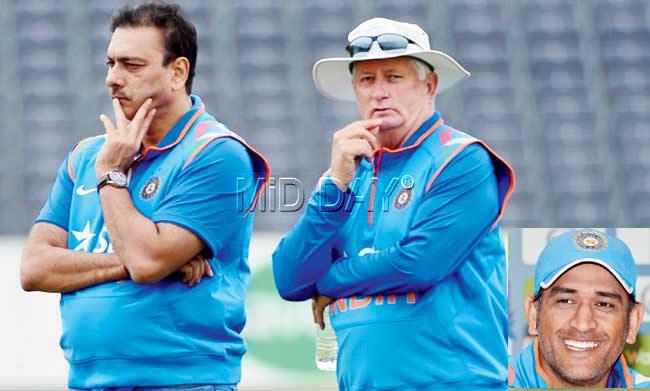 Team India director Ravi Shastri (left) and head coach Duncan Fletcher observe a net session ahead of the first one-day international at Bristol yesterday. (Inset) MS Dhoni Pics/Bipin Patel