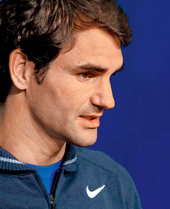 Roger Federer speaks to the media at the Billie Jean King National Tennis Center in New York yesterday. Pic/Getty Images
