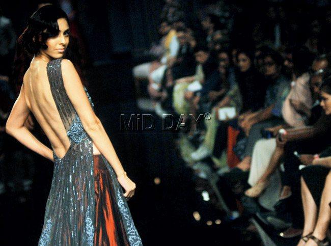 a model displaying a design from Malhotra’s collection