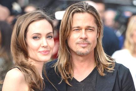 Brad Pitt and Angelina Jolie get married in a quiet ceremony