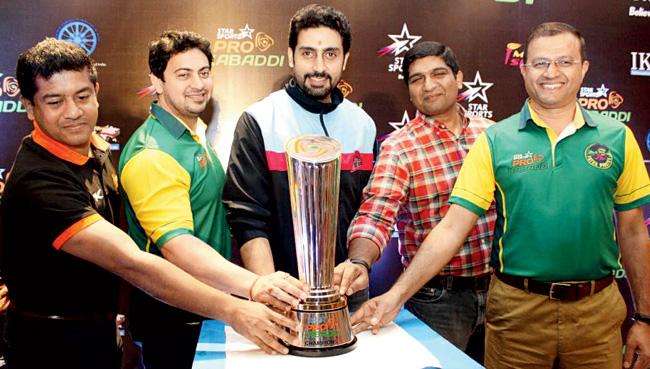 Abhishek Bachchan (centre) during the unveiling of the Pro Kabaddi League trophy yesterday