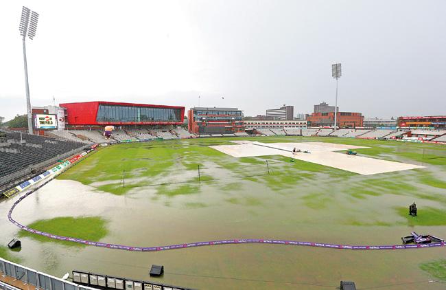 It rained heavily at Old Trafford on Saturday. Pic/Getty Images