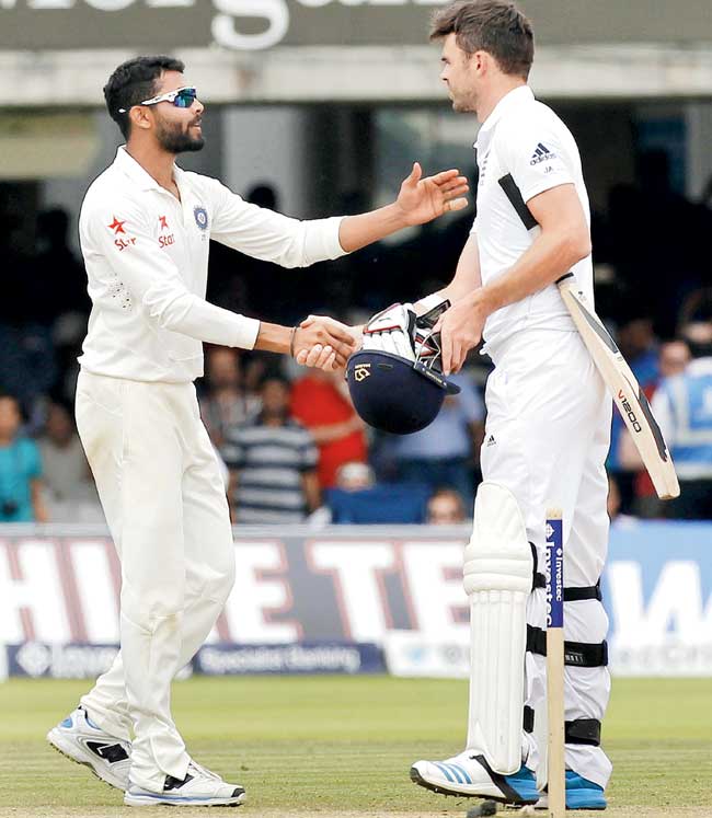 Ravindra Jadeja (left) shakes hands with James Anderson after India