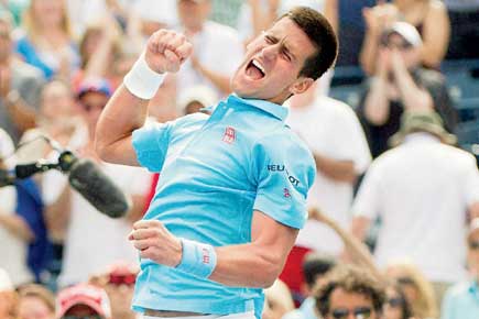 Toronto Masters:  Djokovic battles as Murray sails through