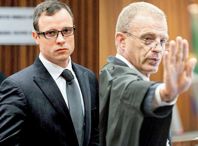 South African athlete Oscar Pistorius and prosecutor Gerrie Nel (right) during the presentation of final arguments of the paralympian