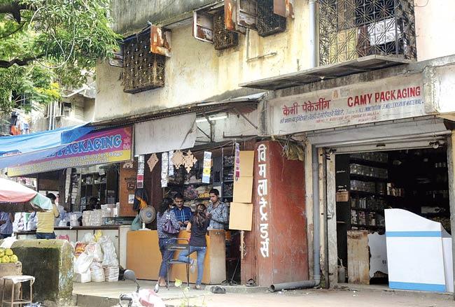 72-year-old Arvind Sanghvi extended a portion of his shop (extreme right) after demolishing a wall of the building. mid-day had reported on the issue in August 2013. File pic