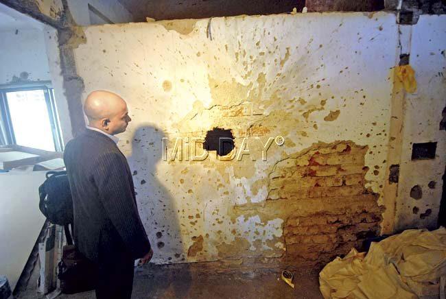 One of the walls that was riddled with bullets. Pics/Sameer Markande and PTI