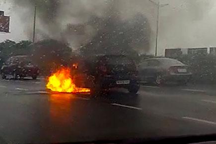 Watch video: Car catches fire on Mumbai highway