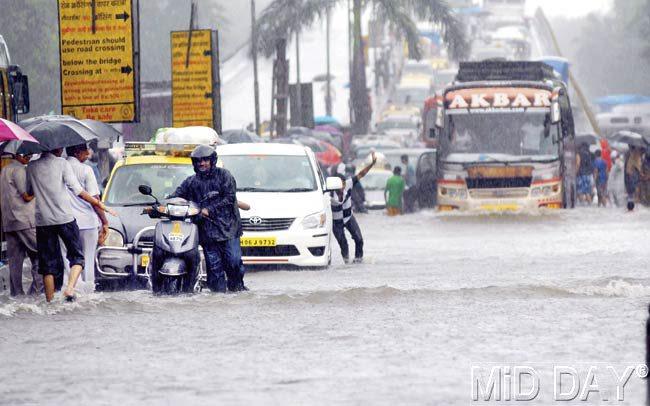 Not just pedestrians but shopkeepers too face different challenges brought on by waterlogging in Dadar. Pics/Shadab Khan