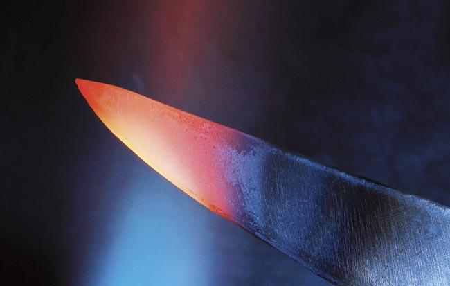 Ajay heated a newly bought knife in the kitchen, before coming out and attacking the family. Pic for representation/Thinkstock