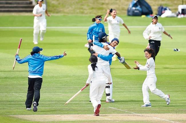 Indian women celebrate their victory over England at Wormsley Cricket Ground