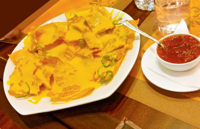 The Nachos with Cheese Sauce were crisp, the cheese was warm and of melt-in-mouth variety