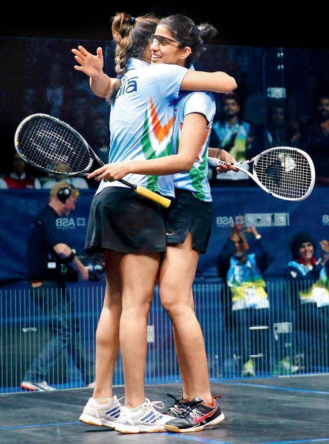 Dipika Pallikal and Joshna Chinappa (right) celebrate winning the final