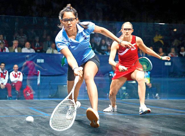 India’s Dipika Pallikal plays a shot during the squash final at CWG Glasgow on Saturday. Pics/Getty Images