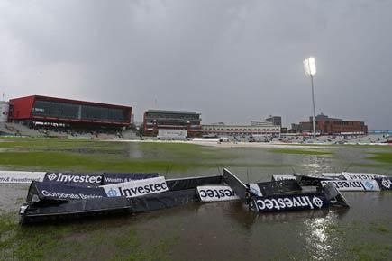 Old Trafford Test: Rain halts England's progress