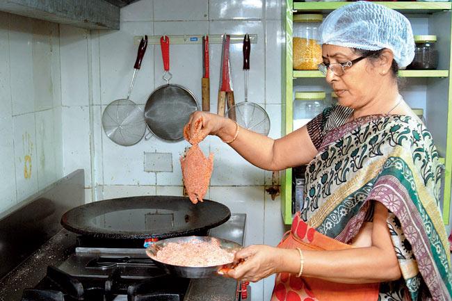 Neeta Acharekar personally cooks the food at the Malvani Katta kitchen. Pics/ Shadab Khan 