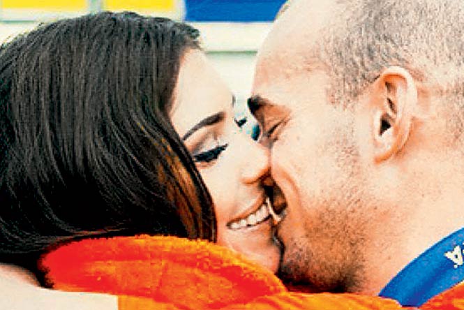 FIFA World Cup: Sneijder's wife cheers up footballer after penalty miss 