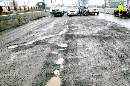 And they're back!: Potholes return to Dindoshi flyover