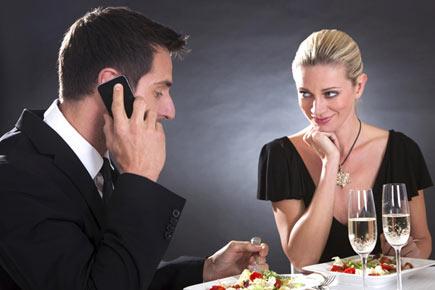 Shut smartphone, enjoy her smile at dinner