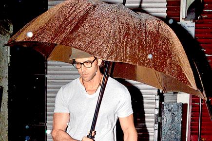 Hrithik Roshan does the cover up act