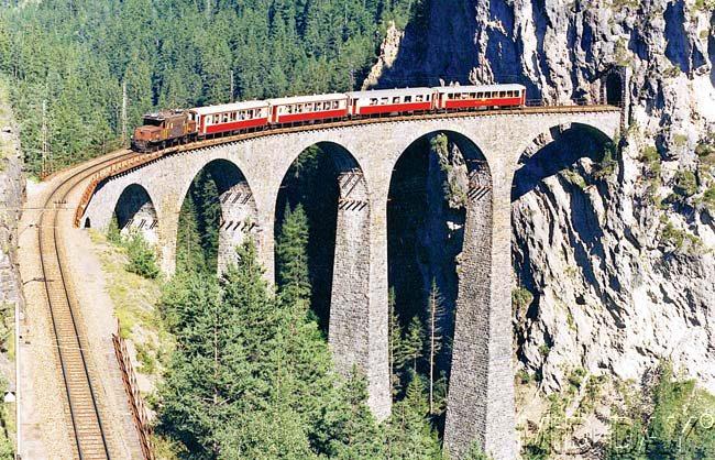 heritage on track: The highest railway line through the Alps leads to Italy: the century-old Albula and Bernina lines of the Rhaetian Railway link northern Europe with the Mediterranean south in such a stunning manner that in summer 2008, it was designated a UNESCO World Heritage site