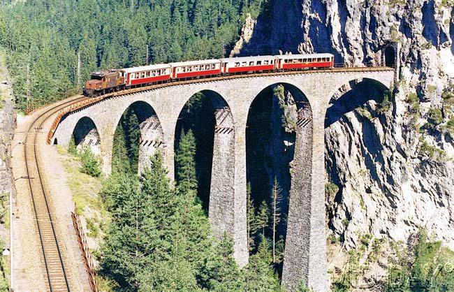 heritage on track: The highest railway line through the Alps leads to Italy: the century-old Albula and Bernina lines of the Rhaetian Railway link northern Europe with the Mediterranean south in such a stunning manner that in summer 2008, it was designated a UNESCO World Heritage site