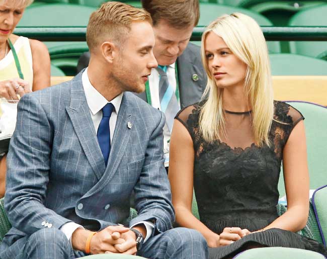 Stuart Broad and Bealey Mitchell in the royal box at Wimbledon on June 28 in London. Pic/Getty Images