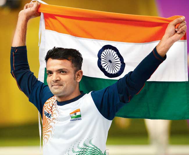 Pistol shooter Vijay Kumar, who won four medals at the 2010 Commonwealth Games, is the flag-bearer for India at Glasgow. Pic/Getty Images 