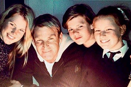 Shane Warne posts old pictures of his children online