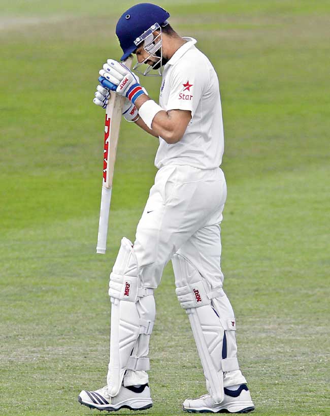 A dejected Virat Kohli walks back to the pavilion after being out for 39 yesterday. Pic/AFP