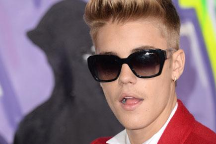 Justin Bieber's friend threatens to shoot his fans