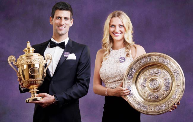 Novak Djokovic and Petra Kvitova pose with their respective trophies in Wimbledon on Sunday evening. Pic/Getty Images