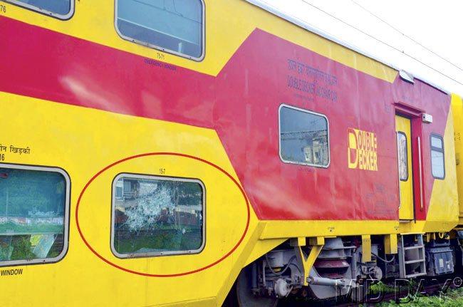 The bright yellow coaches have blue plastic foil all over them as well as tape on the windows. Pics/Shrikant Khuperkar