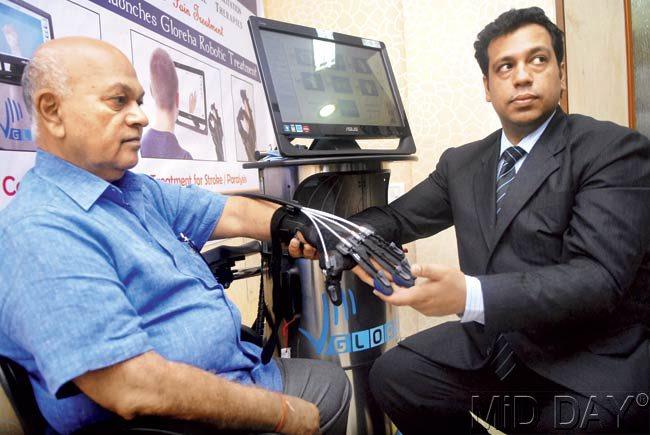 Dr Sanjay Bakshi with a patient. Pic/Pradeep Dhivar