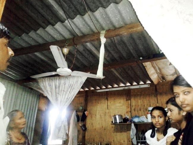 The teenager’s home, with the dupatta hanging from the ceiling