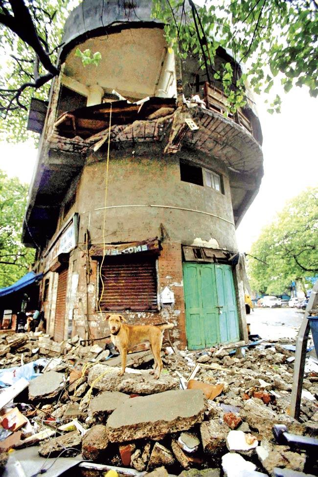 Heavy rains on Saturday led to three incidents of building and wall collapse in the city. Pic/PTI