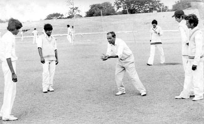 Colonel Hemu Adhikari giving his wards some catching tips at one of the many National camps he spearheaded in the 1970s. Pic/mid-day archives