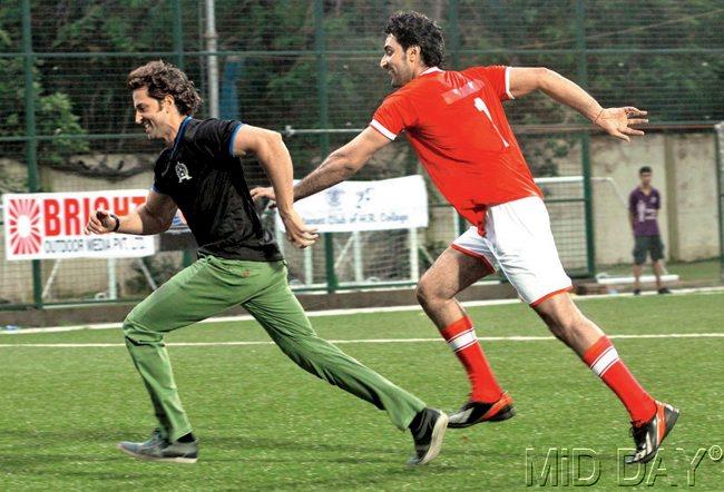 Hrithik Roshan and Kunal Kapoor chase the ball