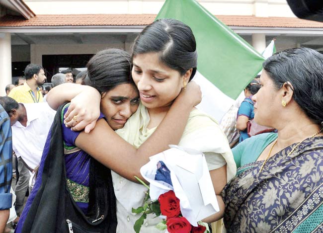 Indian nurses who had been holed up for more than a week in Tikrit returned home on Saturday aboard a special flight. Pic/PTI